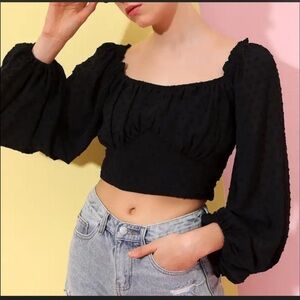 Black long sleeve top with polka dots and ruffle details NEVER WORN